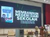 PERPUSTAKAAN UNIMED SUKSES MENGGELAR PELUNCURAN DAN BEDAH BUKU MEMBANGUN NEGERI DARI SEKOLAH